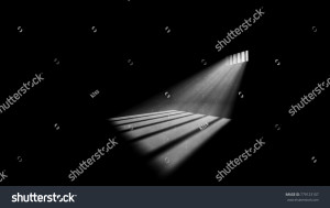 stock-photo-a-striking-d-illustration-of-jail-window-light-in-a-completely-dark-prison-cell-the-rays-of-sun-779123107